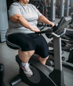 fat woman on bike