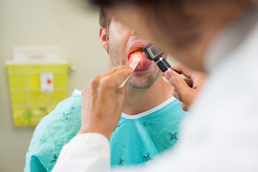 asymmetrical enlargement of tonsils