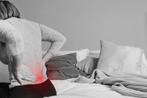 Low Back Pain in the Morning: Causes & Solutions